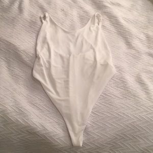 Naked Wardrobe White One Piece